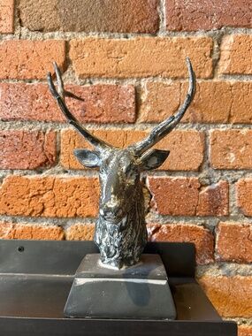 Stag head on base